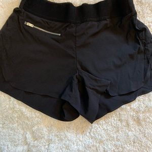 Athleta nylon black shorts size 4.